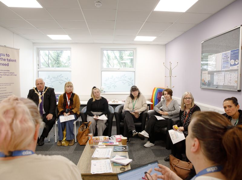 The Lord Mayor of Stoke-on-Trent joins a group of local residents and partners at an information session during the CDAS Open Day